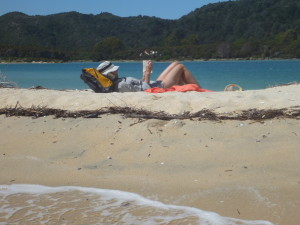 Helen takes a break wt Awaroa waiting for the low tide